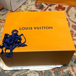 Authentic Louis Vuitton box and ribbon